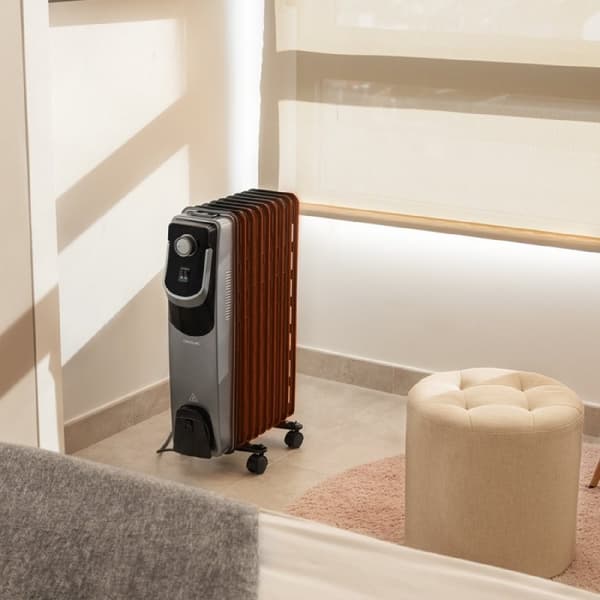 Cecotec 9-fin oil-filled heater, 2000 W, 360º technology, 3 power levels, 22-m² coverage area, cord winder, easy control, handle, caster and double s