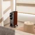 Miniatyrbild 2 av 5: Cecotec 9-fin oil-filled heater, 2000 W, 360º technology, 3 power levels, 22-m² coverage area, cord winder, easy control, handle, caster and double s