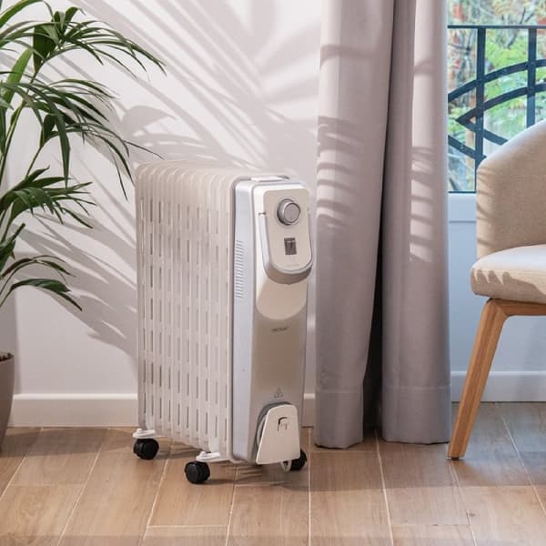 Cecotec 11-fin oil-filled heater, 2500 W, 360º technology, 3 power levels, 28-m² coverage area, cord winder, easy control, handle, caster and double