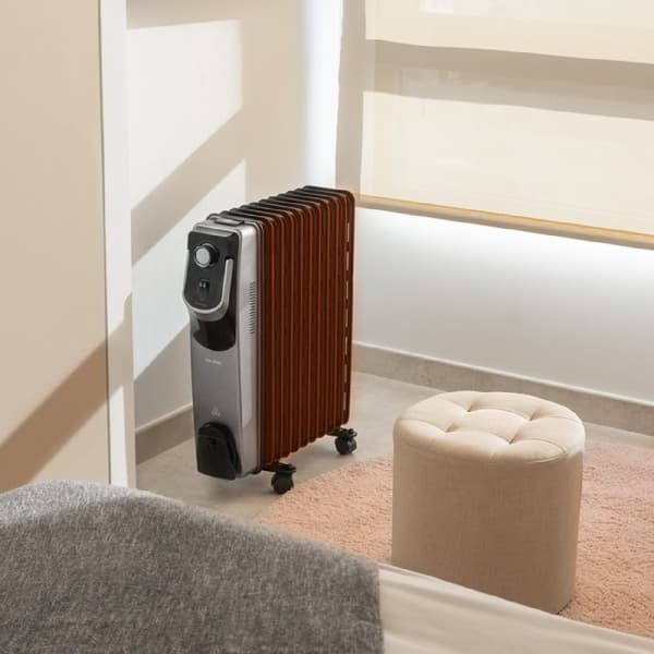 Cecotec 11-fin oil-filled heater, 2500 W, 360º technology, 3 power levels, 28-m² coverage area, cord winder, easy control, handle, caster and double