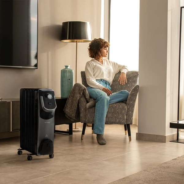 Cecotec 11-fin oil-filled heater, 2500 W, 360º technology, 3 power levels, 28-m² coverage area, cord winder, easy control, handle, caster and double