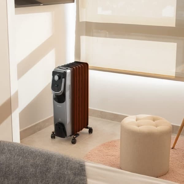 Cecotec 7-fin oil-filled heater, 1500 W, 360º technology, 3 power levels, 18-m² coverage area, cord winder, easy control, handle, caster and double s
