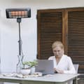 Miniatyrbild 3 av 5: Cecotec Halogen stand or wall heater, 2000 W, for outdoors use. Quartz. IP24. Remote control. 7-hour timer. 2 power levels. Adjustable height.