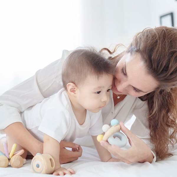 PLANLEKSAKER Rattle Bell pastell