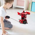 Miniatyrbild 2 av 4: SHOP-STORY - Fjärrstyrd bil som kan förvandlas till en robot - Röd