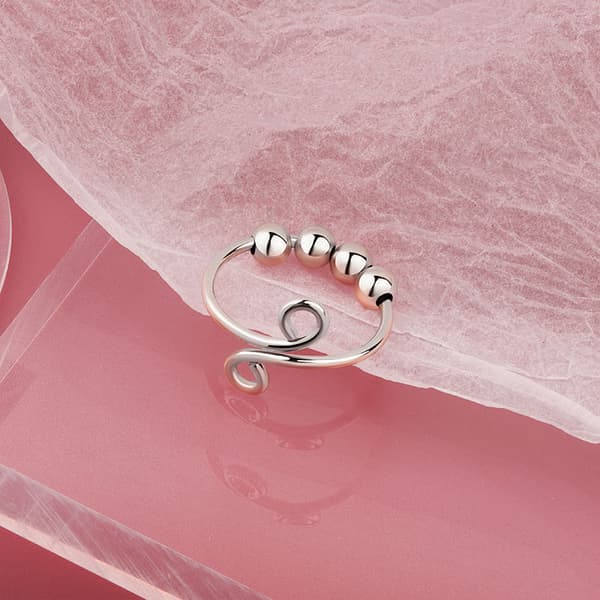 INF Justerbar antistressring med roterbare perler i platinagull