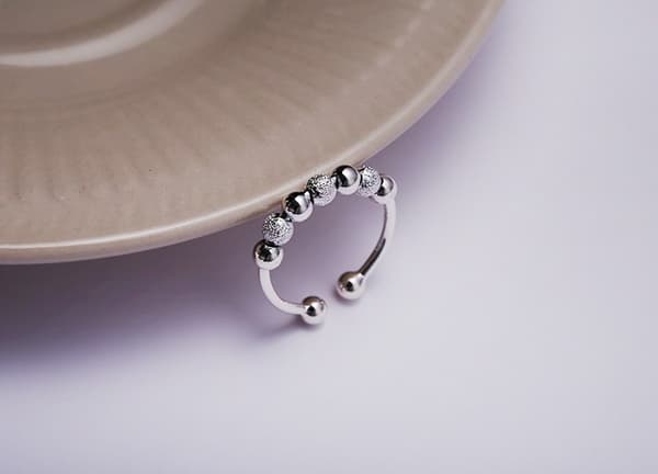 INF Anti-stressring med 7 roterbara pärlor koppar Silver
