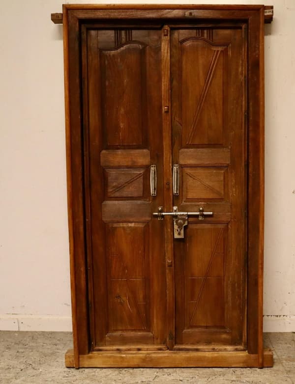 Indian door with stylish fittings.
