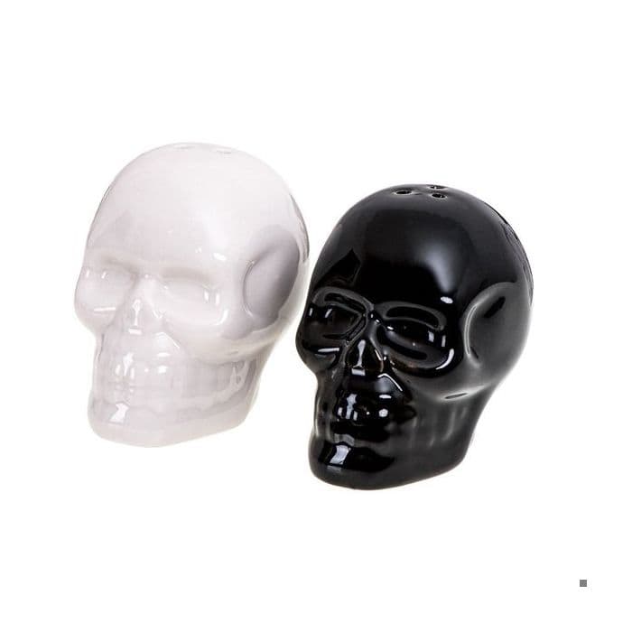 Pepparshaker och saltshaker i form av saltpepparskallskallar * Material: keramik * Shakerstorlek: 6,5 x 4 x 5 cm *