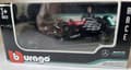 Miniatyrbillede 3 af 5: F1 bil MERCEDES W12 E P. #77 Bottas Bburago 1:43