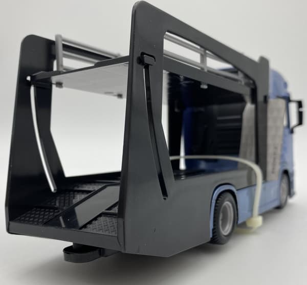 Scania 770 S bärgningsbil Lora Porsche Macan Bburago 1:43