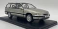 Pikkukuva 10 / 11: Opel Omega A2 Caravan 1990 malli METALLI 124165 WhiteBox 1:24 hopea