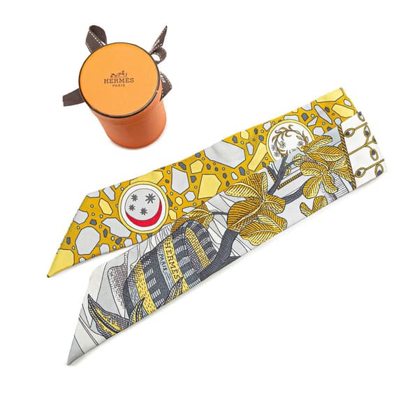 Pre-owned Hermès La Danse Des Amazones Twilly Silk Scarf Yellow