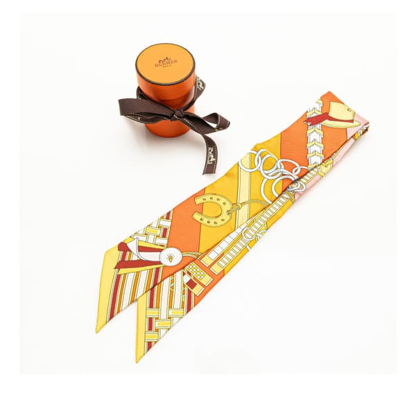 Pre-owned Hermès Brides et Gris-Gris Silk Twilly Scarf Orange