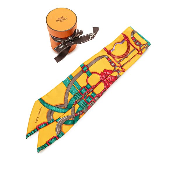 Pre-owned Hermès Grand Manege Silk Twilly Scarf Yellow