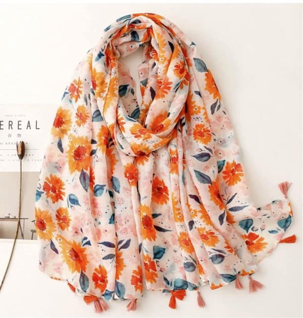 Orange scarf with tassels suitable for all seasons