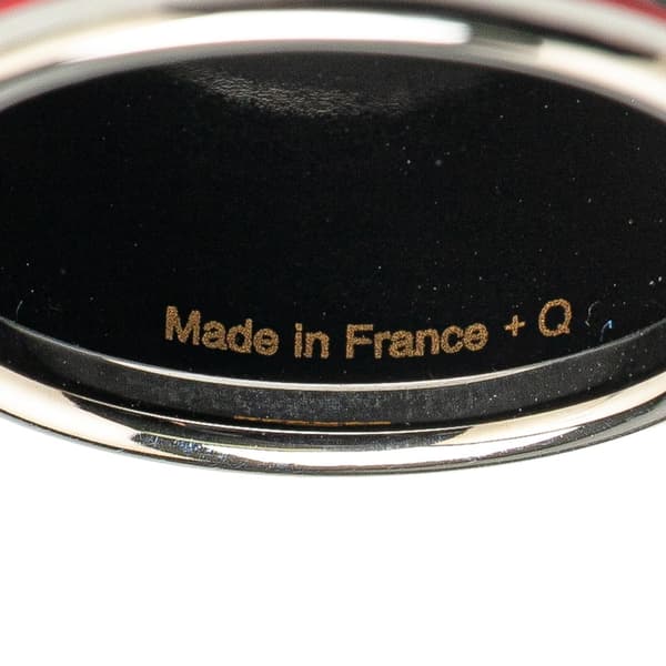 Pre-owned Hermès Enamel and Palladium Plated Brazil Feather Scarf Ring Orange