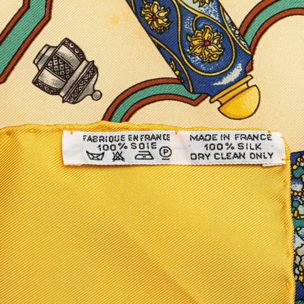 Pre-owned Hermès Qu'Importe Le Flacon Silk Scarf Yellow