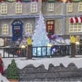 Miniatyrbild 3 av 4: Livlig och ljus jultomteby i centrumfontän