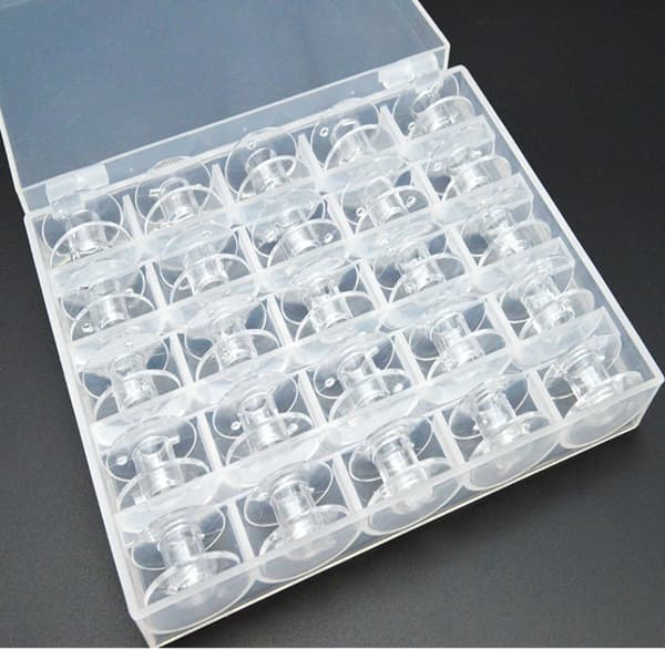 INF Tomspolar för symaskin plast 25 st Transparent