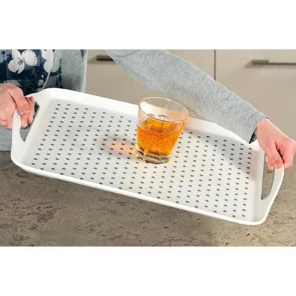 Snygg och praktisk bricka för praktiska föremål och drycker