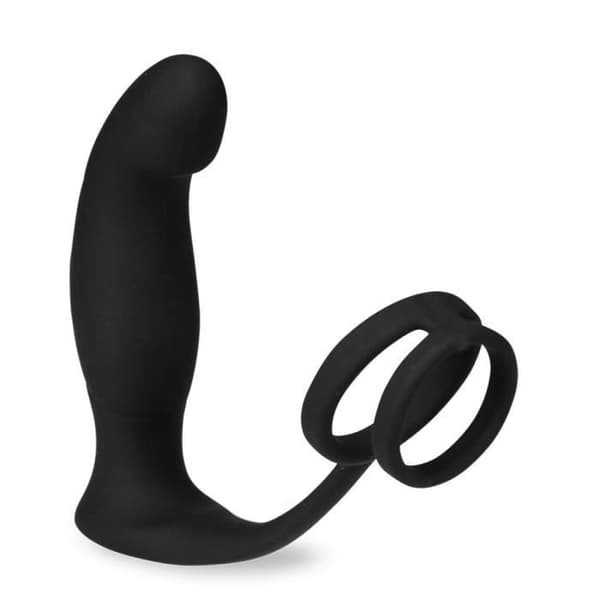 Vandrande svart vibrerande prostatastimulator och dubbel kukring