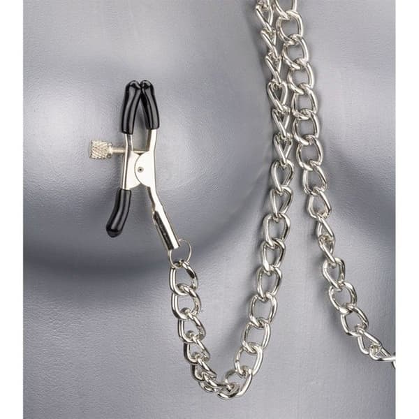 Klädsel i läder BDSM med bröstklämmor