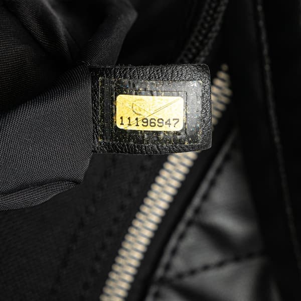 Pre-owned Chanel Paris Biarritz Quilted Coated Canvas Shoulder Bag Black