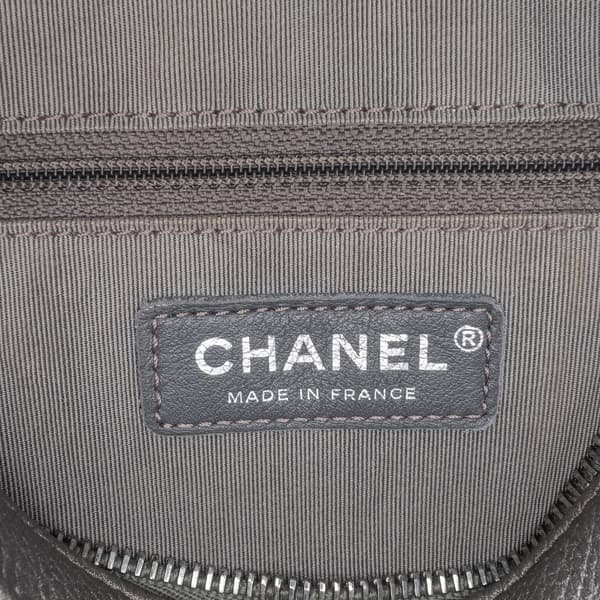 Pre-owned Chanel Medium Metallic Quilted Caviar Casual Rock Flap Gray