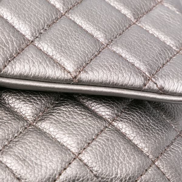 Pre-owned Chanel Medium Metallic Quilted Caviar Casual Rock Flap Gray