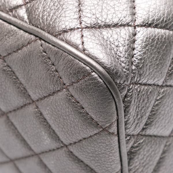 Pre-owned Chanel Medium Metallic Quilted Caviar Casual Rock Flap Gray