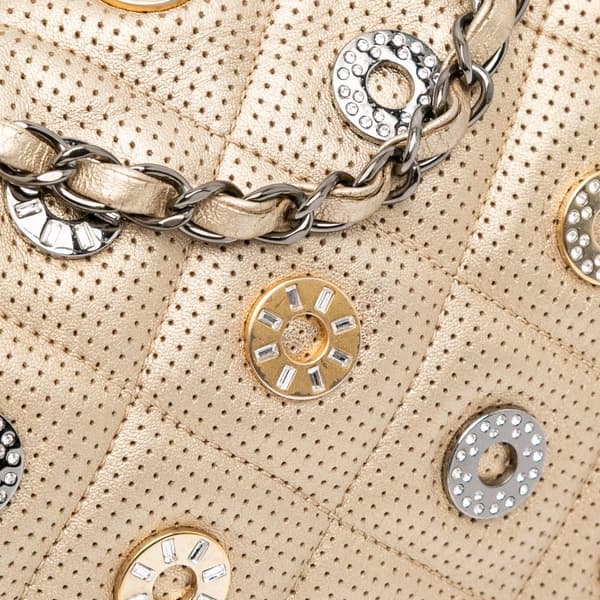 Pre-owned Chanel Paris-Dubai Small Perforated Metallic Lambskin Medals Flap Gold