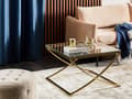 Miniatyrbillede 2 af 7: Guldfarvet sofabord med stel i rustfrit stål og glasplade i glamourstil