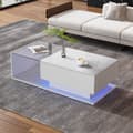 Miniatyrbild 2 av 11: Högblank vit soffbord 100x50x32 cm med glasplatta, låda, LED-belysning, reptålig – modern stil