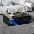 Miniatyrbillede 3 af 11: Sofabord i sort højglans 100x50x32 cm med glasplade, skuffe og LED-belysning – ridsefast, moderne stil