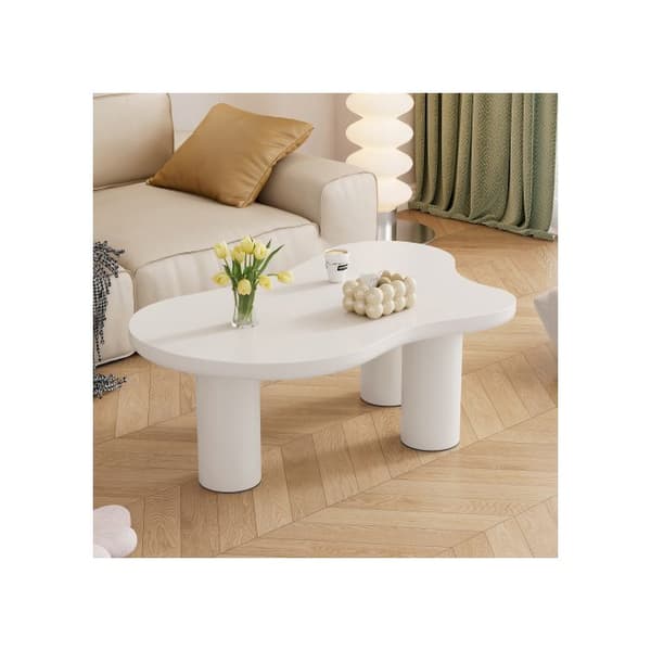Soffbord i oregelbunden molnform, längd 107 cm, bredd 66 cm, höjd 40,5 cm, skiva MDF och ben PVC.