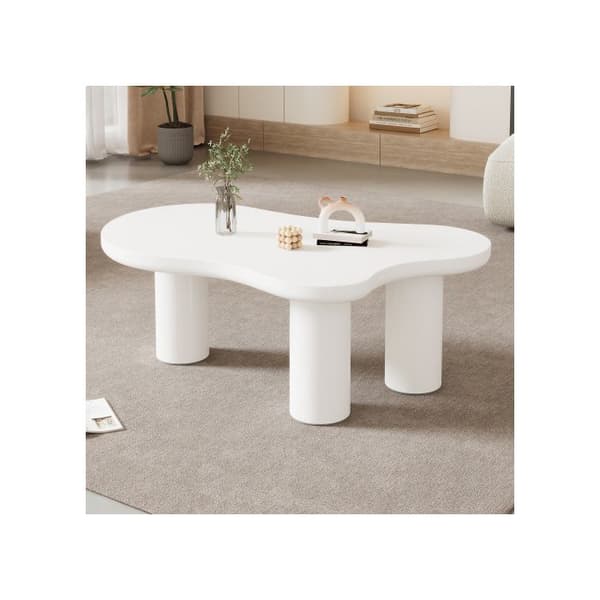 Soffbord i oregelbunden molnform, längd 107 cm, bredd 66 cm, höjd 40,5 cm, skiva MDF och ben PVC.