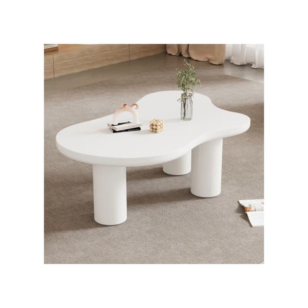 Soffbord i oregelbunden molnform, längd 107 cm, bredd 66 cm, höjd 40,5 cm, skiva MDF och ben PVC.