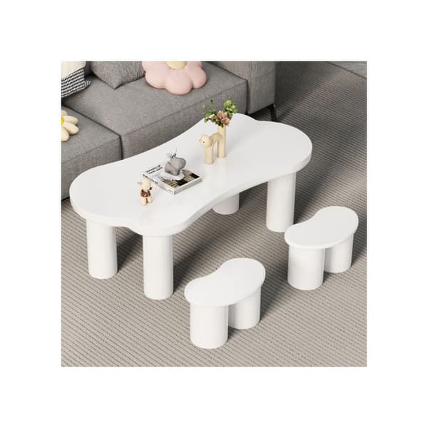 Oregelbunden soffbord i benform, längd 113 cm, bredd 58 cm, höjd 40,5 cm, med 2 små bänkar.