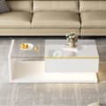 Miniatyrbillede 1 af 11: Sofabord 100 cm med LED-belysning og glasplade – Hvid højglans, moderne design til stuen