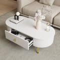 Miniatyrbillede 2 af 11: Hvidt sofabord med 2 skuffer, guldfarvede greb og ben, afrundede hjørner – moderne design, stuebord i MDF