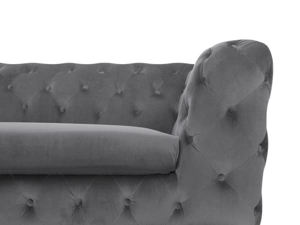 Den grå Chesterfield quiltede sofa er elegant fløjlsfløjl