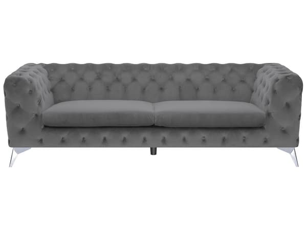 Den grå Chesterfield quiltede sofa er elegant fløjlsfløjl