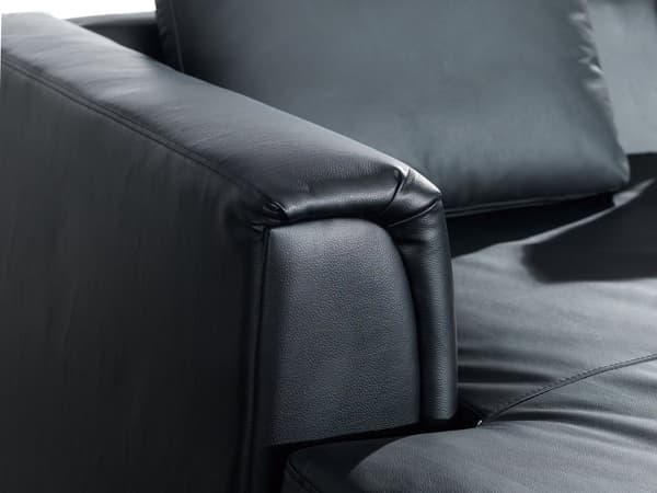 Hjørnesofa svart skinnpolstret med ottomansk L-sofa høyreorientering