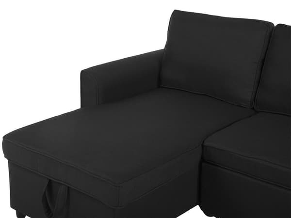 Hjørnesovesofa i svart stoff med polstring og oppbevaringsseng i høyrevendt retning