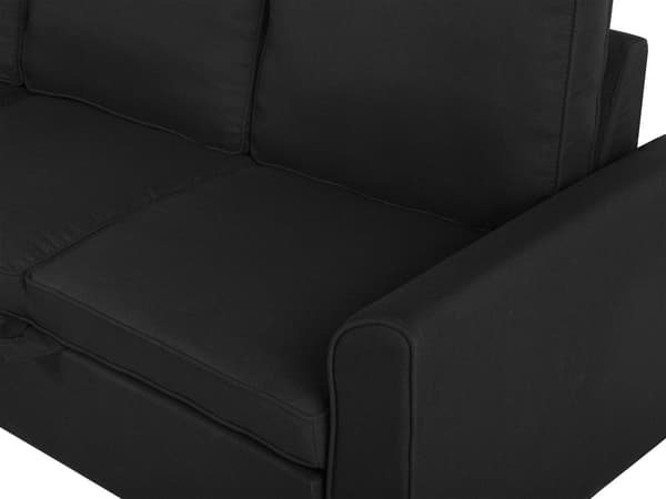 Hjørnesovesofa i svart stoff med polstring og oppbevaringsseng i høyrevendt retning