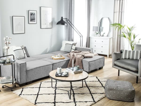 Hjørnesofa i grått stoff med polstring 3-seters venstrevendt L-formet seng