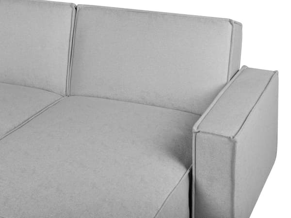 Hjørnesofa i grått stoff med polstring 3-seters venstrevendt L-formet seng