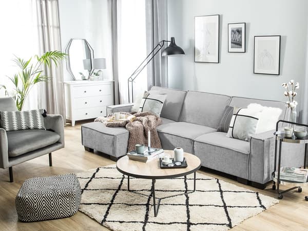 Hjørnesofa i grått stoff med polstring 3-seters høyrevendt L-formet seng