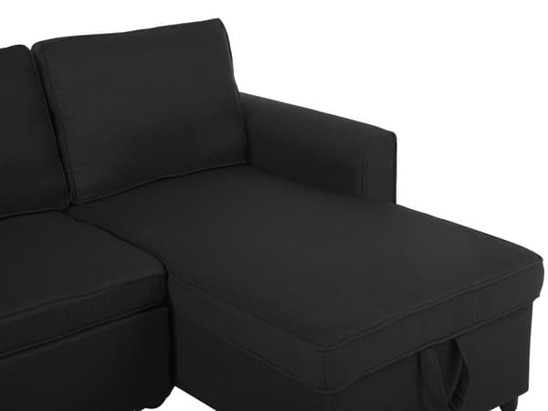 Hjørnesovesofa i svart stoff med venstrevendt polstring og oppbevaringsseng
